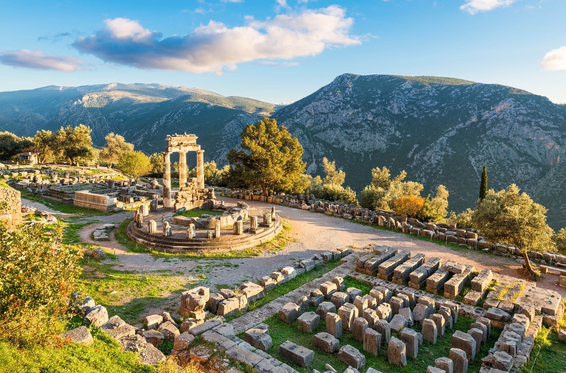 The ruins at Delphi with mountains in the background